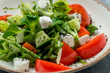 salad with tomatoes, cucumbers and farmer's cheese