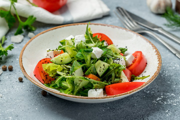 salad with tomatoes, cucumbers and farmer's cheese