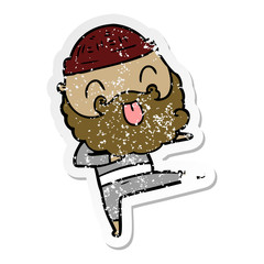 distressed sticker of a man with beard sticking out tongue