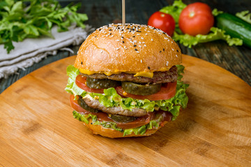 A double cheeseburger on the Board