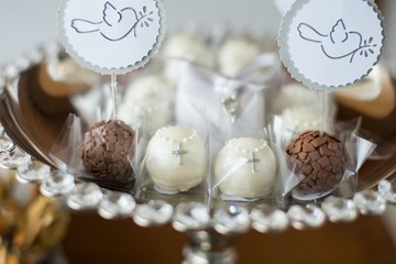 Sweets and decoration on the table - Baptism theme