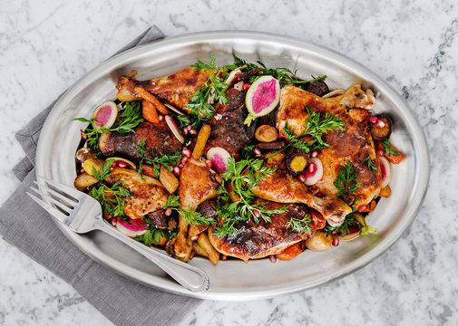 Roasted Chicken with carrots, radishes, and pomegranate 
