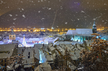 Brasov, Transylvania. Romania. Panoramic view of the old town and Council Square in the winter time, Aerial cityscape of Brasov city, Transylvania landmark in Romania