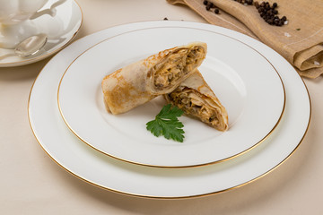 Pancake with chicken and mushrooms