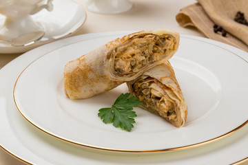 Pancake with chicken and mushrooms