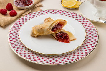 Pancake with raspberry jam