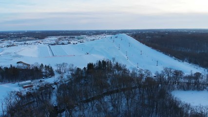 Snow park in Wisconsin, winter activities (tubing, skiing, snowboarding). Drone shots , bird's eyes view
