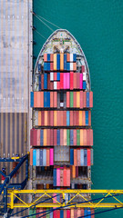 Cargo ship, loading and unloading goods at the deep sea port