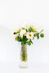 Floral arrangement of callas lilly and gerberas