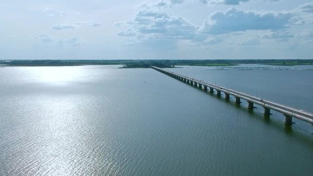 Aerial view Thepsuda Bridge over Lampao Reservoir.Thep Sada Bridge the Deja Vu Bridge is a 2-lane reinforced concrete bridge across Lam Pao Dam at Kalasin,Thailand.