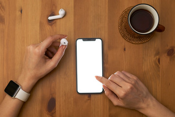 Holding hand on mobile phone