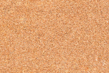 Brown cork board surface for background.