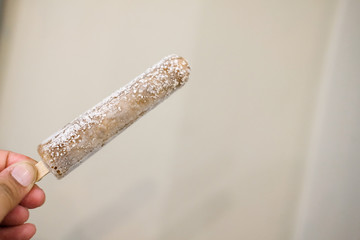 Ice pop in hand, soft drink flavour