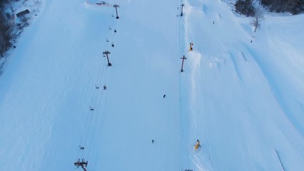 Snow park in Wisconsin, winter activities (tubing, skiing, snowboarding). Drone shots , bird's eyes view