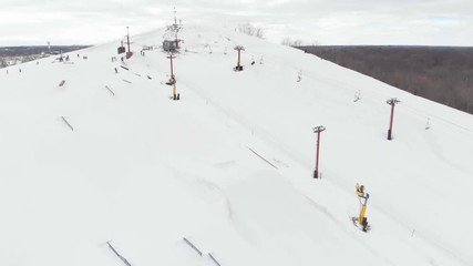 Snow park in Wisconsin, winter activities (tubing, skiing, snowboarding). Drone shots , bird's eyes view