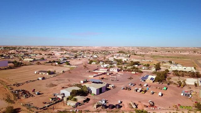 Aerial drone shot reveals the outback bush opal mining town of Coober Pedy, Australia.