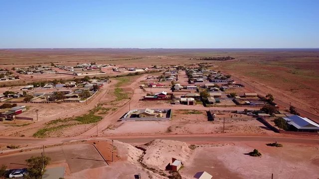 Aerial drone shot reveals the outback bush opal mining town of Coober Pedy, Australia.