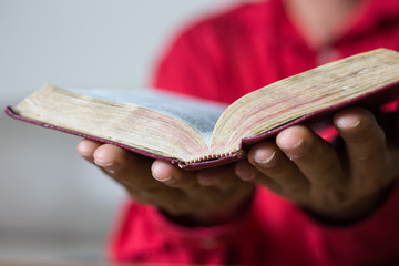 Man reading the Holy Bible. book