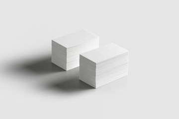 Business Cards stacks mock-up isolated on soft gray background. 3D rendering