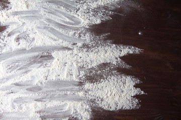 flour on a wooden table