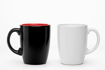 Blank black and white ceramic mug mockup isolated. Empty gift pint set branding template. 