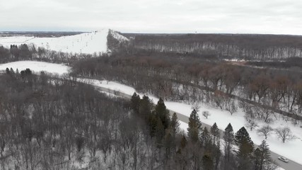 Snow park in Wisconsin, winter activities (tubing, skiing, snowboarding). Drone shots , bird's eyes view
