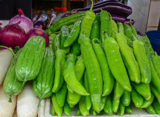 Fresh green peppers for sale at rural market