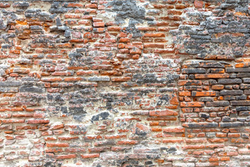 Naklejka premium Black and orange brick texture.