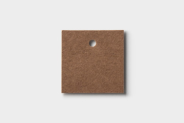 Square Brown Kraft paper price tag Label on white background top view Mock up. Empty Kraft paper tag label.High resolution photo. 