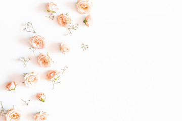 Flowers composition. Rose and gypsophila flowers on white background. Flat lay, top view, copy space
