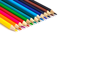 Colored pencils isolated on white with copy space