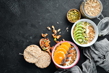Oatmeal with fruit. Top view. Free space for your text.