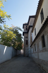 Fototapeta na wymiar Street of the Albaicin neighborhood in Granada. Spain
