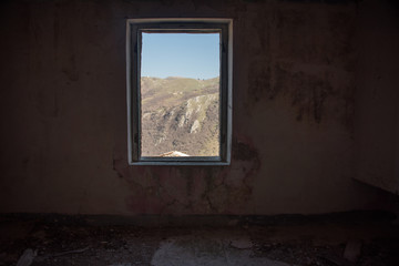 Looking out a Window in an Abandoned Ruin in Southern Italy