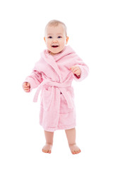 cute baby girl in pink bathrobe after bath standing isolated on white