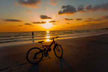 Fototapeta na wymiar Thailand, Adult, Adults Only, Beach,man.bike,sunset