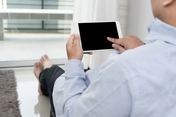 Man hand holding the black smartphone screen mockup