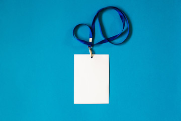 Empty ID card badge icon with blue belt, on blue background. Space for text,  staff identity name...