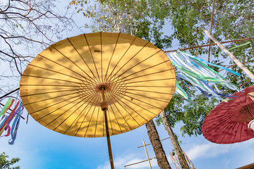 Fototapeta premium Yellow umbrella and blue sky.