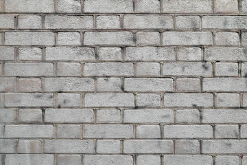 mur en briques rectangulaire grises