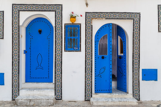Typical white and blue facade in Bizerte, Tunisia