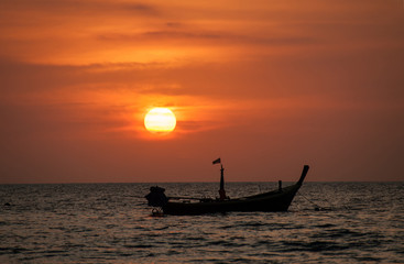 Sunset on the Naithon beach on Phuket in Thailand