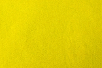 Yellow felt background. Surface of fabric texture. Seamless Square Background