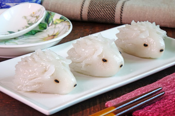 Dumpling : Cute porcupine shaped dumpling, delicious traditional asian food.(Chinese dumpings or Jiaozi) / Dim Sum : Porcupine shaped Dim Sum.