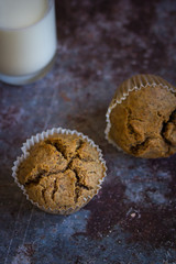 Homemade rye bread and fresh milk, low key, selective focus and toned image