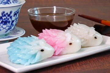 Dumpling : Cute porcupine shaped dumpling, delicious traditional asian food.(Chinese dumpings or Jiaozi) / Dim Sum : Colorful Porcupine shaped Dim Sum.
