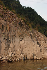 The part of the naked rock near the mountain lake in China