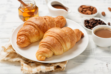 Delicious breakfast with fresh croissants.