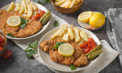 Homemade german schnitzel with pickles