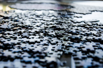 Obraz premium Jigsaw puzzle pieces in a jumble